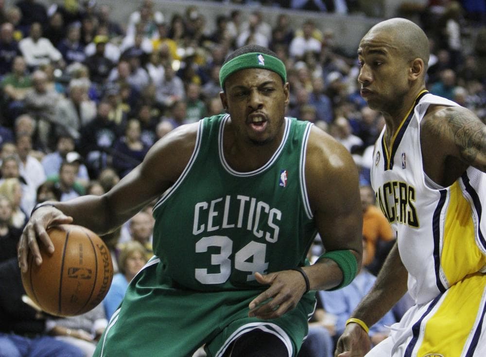Celtics forward Paul Pierce, left, drives to the basket against Pacers guard Dahntay Jones during the first quarter in Indianapolis, Saturday. (AP Photo/Darron Cummings)