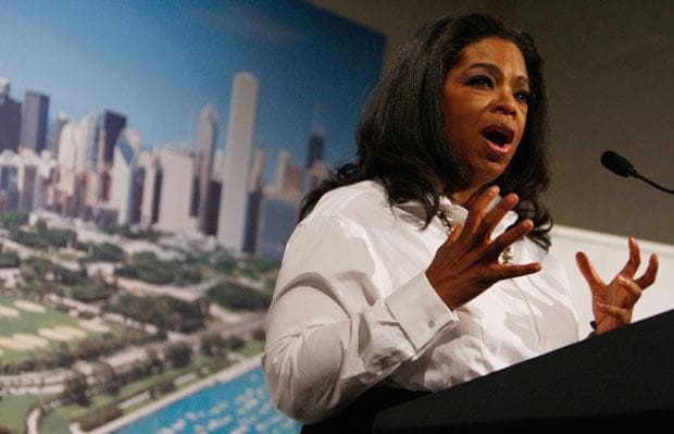 Oprah Winfrey helped President Obama lobby the International Olympic Committee to bring the summer Olympics to Chicago in 2016. She appears here at a dinner with the first lady in September. (Pool photo via Charles Dharapak/AP)