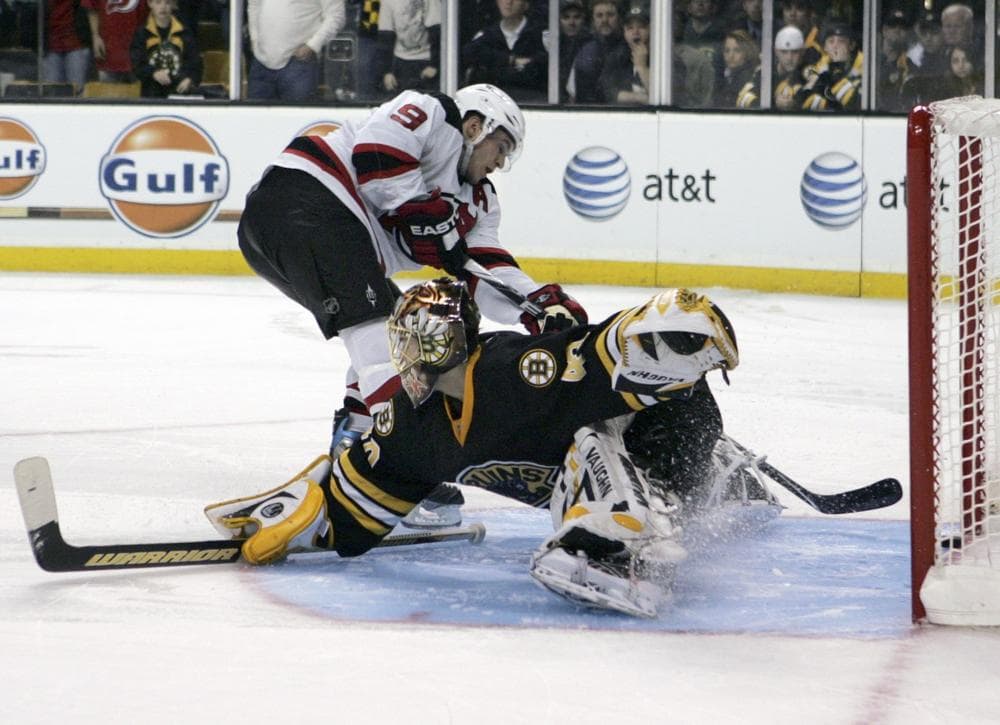 Devils&#039; Zach Parise scores a shootout goal past  Bruins goalie Tuukka Rask  in Boston, Friday.  (AP Photo/Mary Schwalm)
