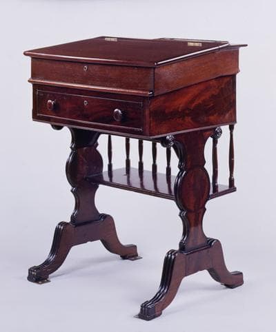 Kennedy used this mahogany desk for most of his 47 years in the back row of the Senate chamber.  He remained in the last row even though he'd long ago earned enough seniority to move to the front row. (U.S. Senate Collection)