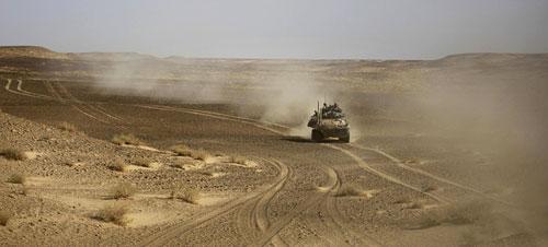 A United States Marine LAV vehicle of the 4th Light Armored Recon on patrol in the volatile Helmand Province of southern Afghanistan, Thursday, Dec. 3, 2009. (AP)