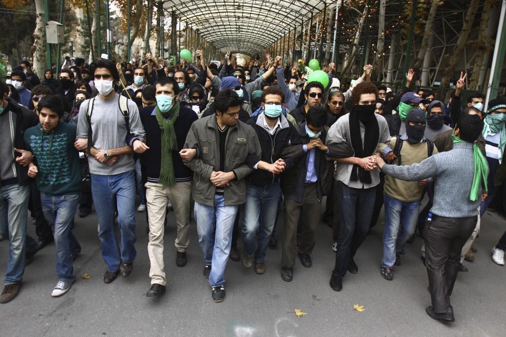 This photo, taken by an individual not employed by the Associated Press and obtained by the AP outside Iran shows pro-reform Iranian students, marching during their protest at the Tehran University campus in Tehran, Iran, on Monday. (via AP)