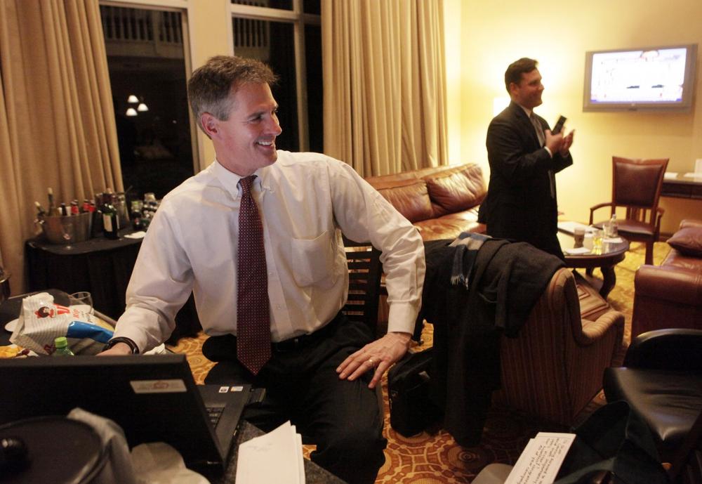 State Sen. Scott Brown reacts as he hears from a campaign staff member in a Newton hotel room that the Associated Press called the primary in his favor. (AP)