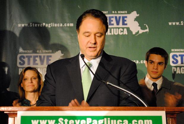 Stephen Pagliuca gives his concession speech as his wife and son look on. (Molly Connors for WBUR) 