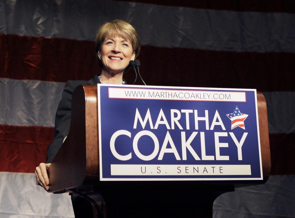 Attorney General Martha Coakley checks the podium at the Sheraton Hotel in Boston on Tuesday. (AP)