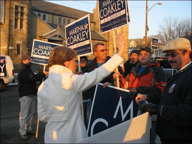 Attorney General Martha Coakley greets voters outside her polling station in Medford. (Monica Brady-Myerov/WBUR)