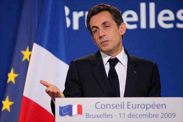 French President Nicolas Sarkozy addresses the media on the second day of a two-day EU summit at the European Council building in Brussels. (Geert Vanden Wijngaert/AP)