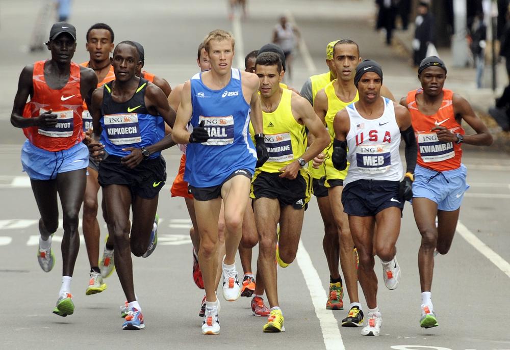Boston Marathon sponsor John Hancock has announced that top American runners Meb Keflezighi and Ryan Hall will participate in the 114th running of the race in April 2010. Here, Keflezighi, second from right, and Hall, center, lead the New York City Marathon, Nov. 1. (AP)