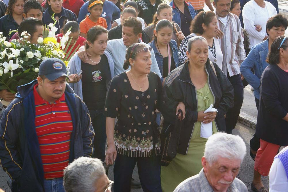 Josefa Angulo Flores, center, and Irma Cordova, center right, aunt and mother, respectively, of Mexican soldier Melquisedet Angulo attend Angulo's funeral in Paraiso, Mexico, Monday, Dec. 21, 2009. Assailants on Tuesday gunned down Flores, Cordova and Angulo's siblings. Angulo was killed in a raid that took out one of Mexico's most powerful cartel leaders , sending a chilling message to troops battling the drug war: You go after us, we wipe out your families. (AP)