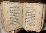 A bookworm-eaten manuscript digitized in Balamand, Lebanon in 2003 (copyright Hill Museum &amp; Manuscript Library)