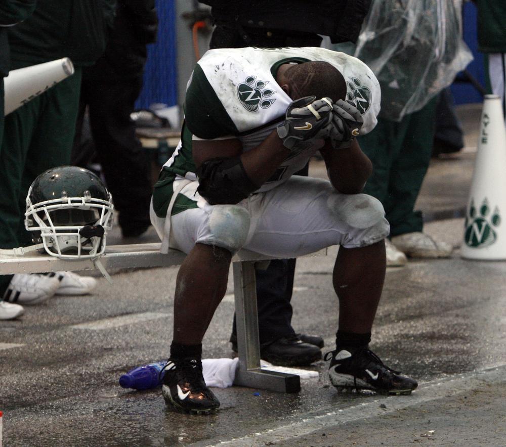 Northwest Missouri State's Xavier Omon in despair during the Bearcats' loss in the 2007 Division II National Championship