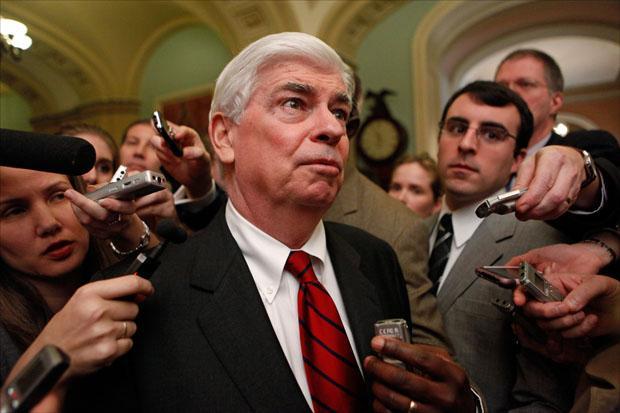 Senate Banking Committee Chairman Sen. Christopher Dodd speaks with reporters on Capitol Hill following a news conference on health care overhaul on Dec. 22, 2009. (Haraz N. Ghanbari/AP)