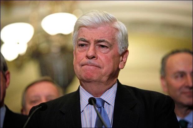 Sen. Christopher Dodd pauses during a news conference on health care, in this Dec. 14, 2009 file photo taken on Capitol Hill. (Haraz N. Ghanbari, File/AP)