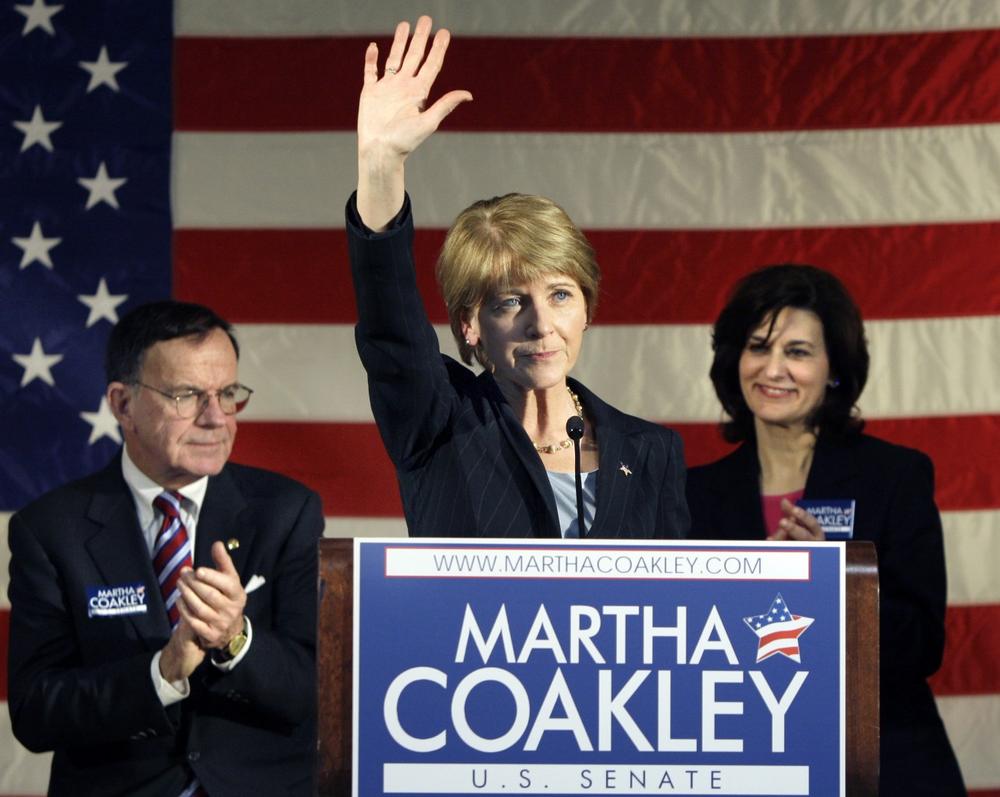 Massachusetts Attorney General Martha Coakley waves during an event where her candidacy for the senate seat of the late Sen. Edward Kennedy was endorsed by his widow, Vicki Kennedy, right, and interim Sen. Paul Kirk, left, in Medford, on Thursday. (AP)
