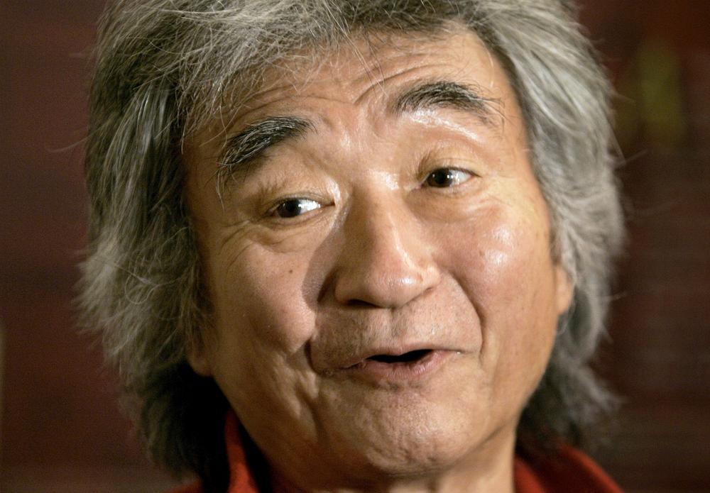 Former Director of the Boston Symphony Orchestra Seiji Ozawa faces reporters moments before conducting the orchestra at Symphony Hall, in Boston in 2008.  It was his first appearance with the BSO since he stepped down as music director in April of 2002. (AP)