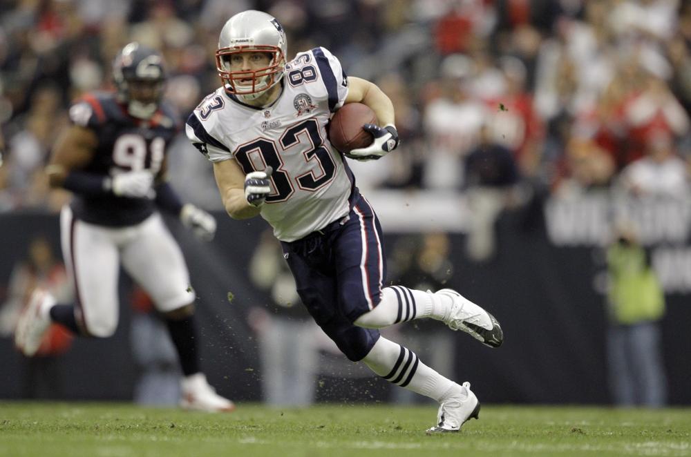 New England Patriots wide receiver Wes Welker makes his 123rd catch of the season on Jan. 3 in Houston. Welker injured his knee on the play. (AP)