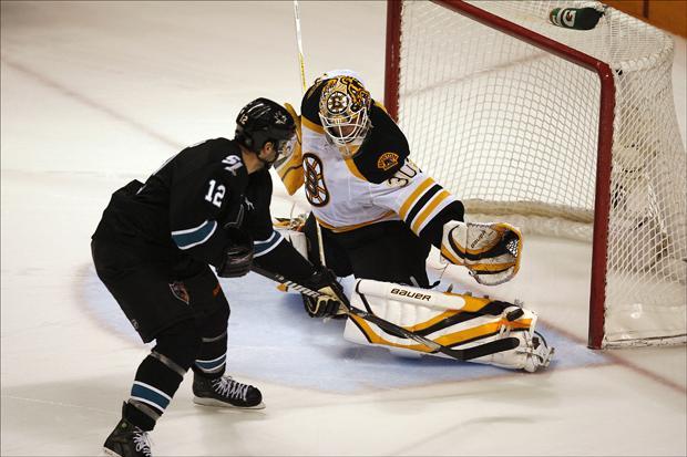 Bruins goalie Tim Thomas makes a save on a shot by San Jose Sharks center Patrick Marleau in a shootout on Thursday. (Tony Avelar/AP)