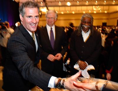Massachusetts State Sen. Scott Brown greets attendees at the Martin Luther King, Jr. Memorial Breakfast Monday at the Hynes Convention Center in Boston. (AP)