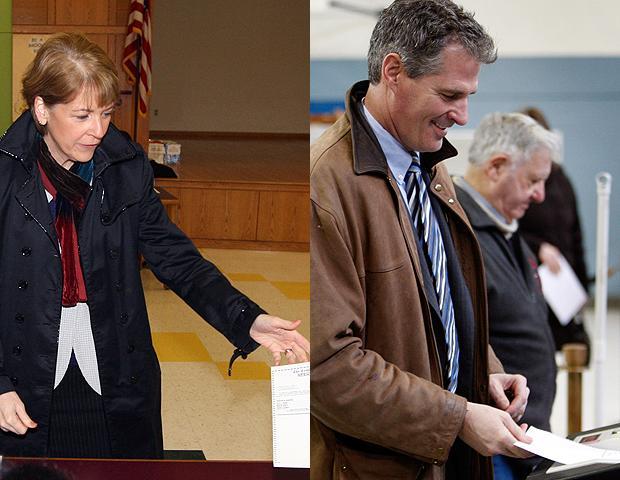 U.S. Senate candidates Martha Coakley, left, and Scott Brown cast their votes in Medford and Wrentham, respectively, on Tuesday morning.  (AP)