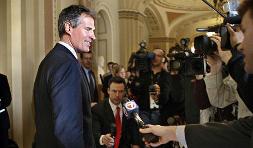 Sen.-elect Scott Brown, R-Mass., is pursued by reporters as he walks on Capitol Hill in Washington, Thursday, Jan. 21, 2010, after a meeting with Senate Majority Leader Harry Reid of Nev. (AP)