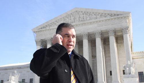 Citizens United President David Bossie talks on his cell phone outside the Supreme Court in Washington, Thursday, Jan. 21, 2010, after the Supreme Court ruled on a campaign finance reform case. (AP)