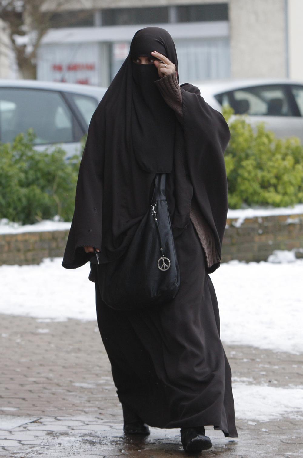 Faiza Silmi, a 32-year-old Moroccan,  in Le Mesnil-Saint-Denis,  southwest of Paris.  (AP)