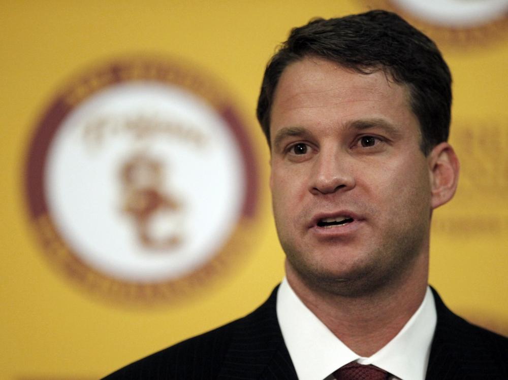 Lane Kiffin speaks as he is introduced as Southern California football coach Wednesday, Jan. 13, 2010, in Los Angeles. Kiffin left Tennessee after one 7-6 season. He arrived late to his first news conference after being stuck in traffic. Kiffin worked as an assistant under Pete Carroll, the coach he replaces at USC, working his way up to offensive coordinator in 2005. (AP Photo/Damian Dovarganes)