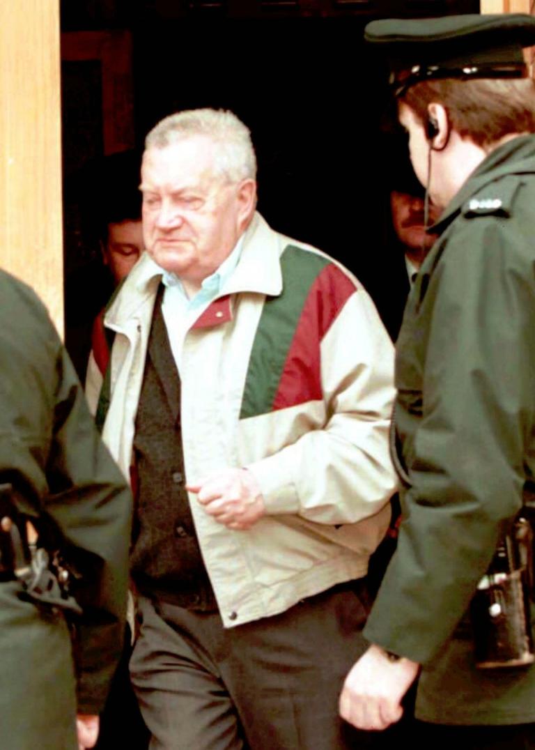The late priest Brendan Smyth was accused of molesting children in Ireland, Britain, North Dakota and Rhode Island. In this undated file photo, Smyth leaves a courthouse in northern Ireland. (AP) 