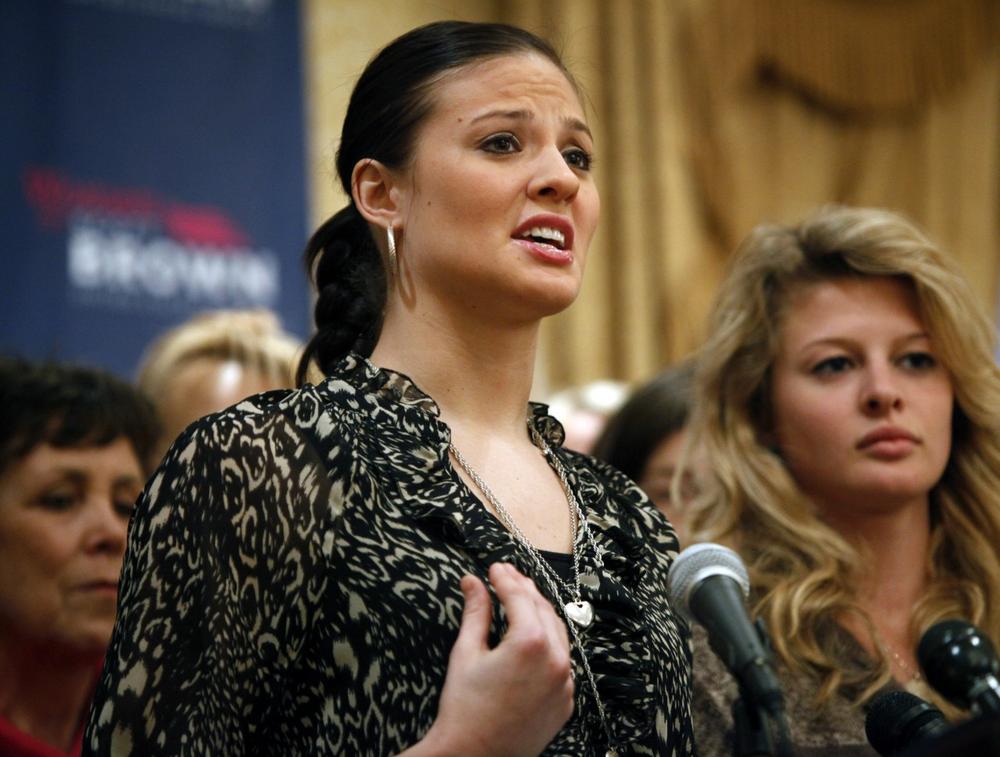 Ayla Brown, daughter of Republican candidate for the U.S. Senate Scott Brown, faces reporters with her sister Arianna Brown, right, during a news conference at a hotel in Boston on Tuesday. (AP)