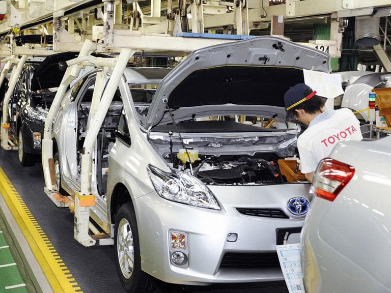 Toyota Prius models come off a Japanese assembly line in June 2009. Toyota officials said Wednesday that the company has received dozens of complaints involving the brakes in the latest Prius model. (AP)