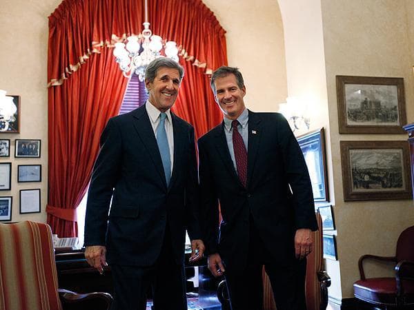 Brown, right, meets with Sen. John Kerry in Washington on Jan. 21.  Kerry will escort Brown down the Senate aisle during Brown&#39;s swearing-in. (AP)