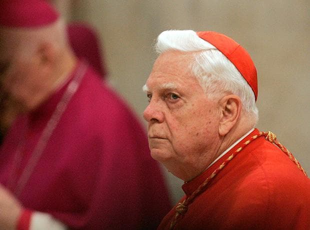 U.S. Cardinal Bernard Law, Archpriest of the Papal Liberian Basilica of Santa Maria Maggiore, looks on as Pope Benedict XVI recites a Rosary prayer inside the Basilica in Rome in May 2008. (AP)