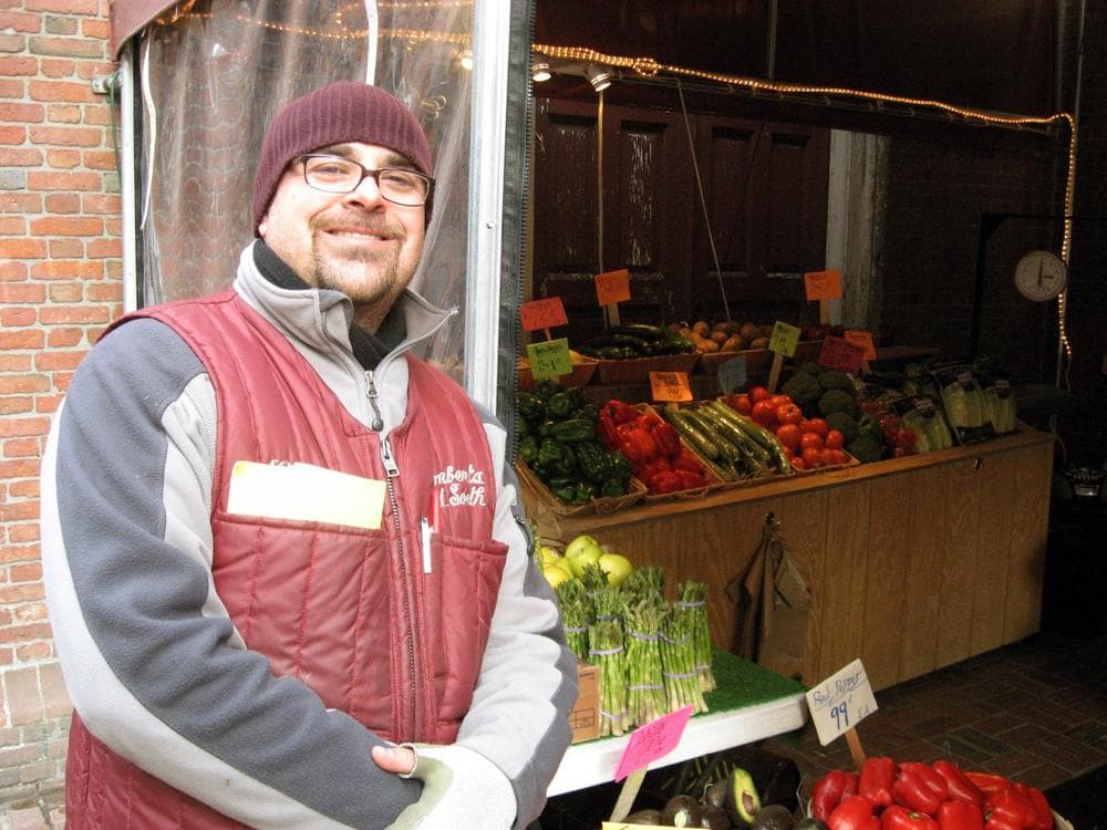 Craig Good, a former mortgage broker, runs a fruit stand at Boston's Old South Meeting House. (Curt Nickisch/WBUR)