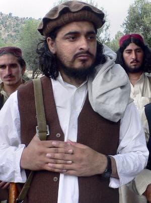 In this Oct. 4, 2009, file photo, Pakistani Taliban chief Hakimullah Mehsud arrives to meet with media in Pakistan's tribal area of South Waziristan along the Afghanistan border. Mehsud has died, the country's top civilian security official said Wednesday. (AP)