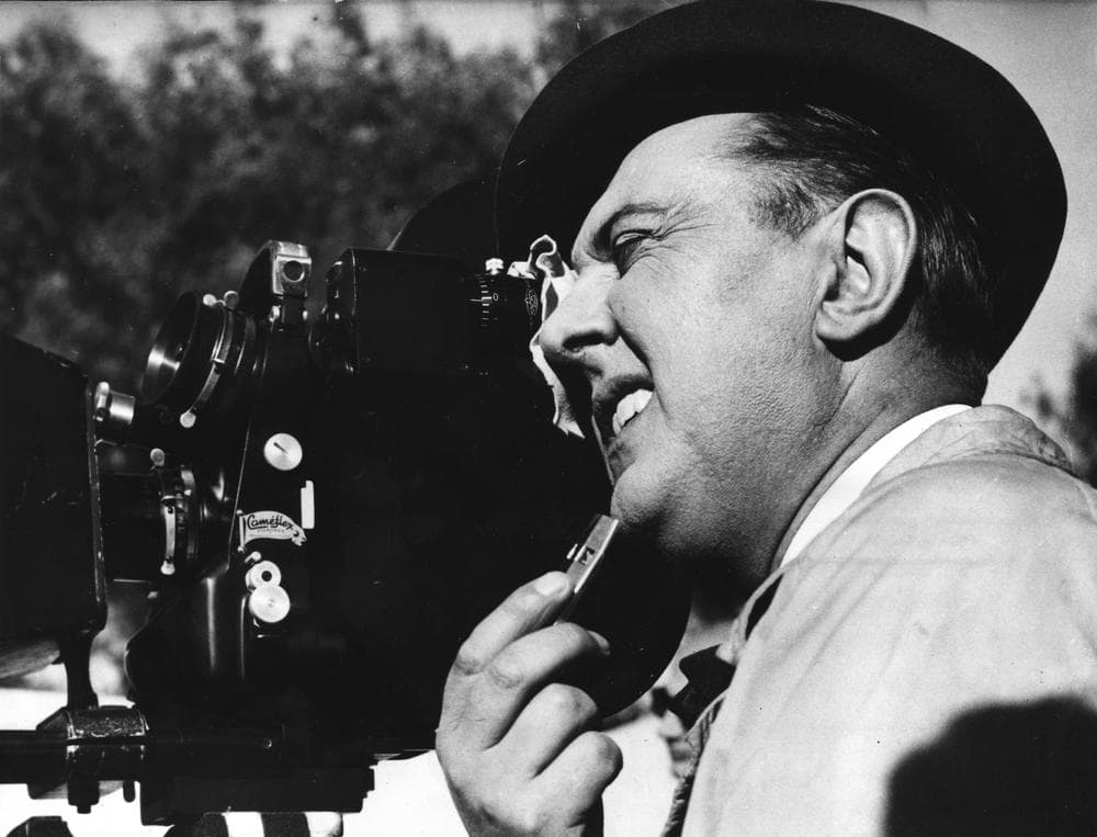 French movie producer, Jacques Tati shoots a scene,  jumping in the role as camera man on the set producing his latest and third film &quot;Mon Uncle&quot; (My Uncle) in France, April 1958. (AP)