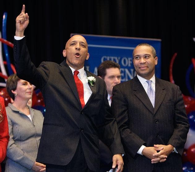 Lawrence Mayor and state Rep. William &quot;Willy&quot; Lantigua, left, with Mass. Gov. Deval Patrick during his inauguration ceremony Jan. 4, 2010. (Charles Krupa/AP)