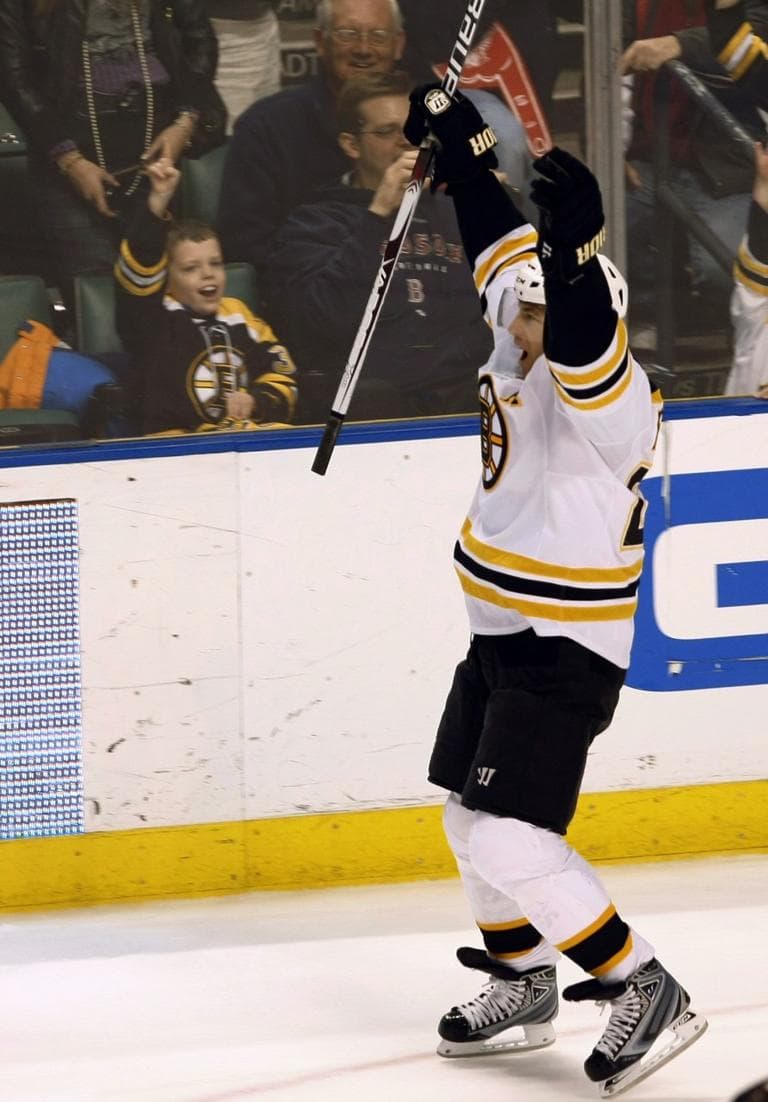 Mark Recchi celebrates after scoring against the  Panthers in a shootout in Sunrise,  Fla., Saturday. (AP Photo/Alan Diaz)