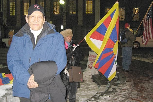 Kuncho Palsang, Massachusetts' first Tibetan immigrant, appears at the weekly Tibetan vigil in Harvard Square, Cambridge on Wednesday. (Karen Pelland/WBUR)