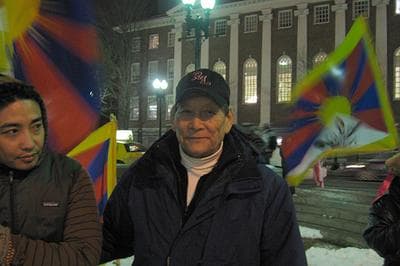 Kuncho Palsang at a vigil in Harvard Square on Wednesday. (Karen Pelland/WBUR)