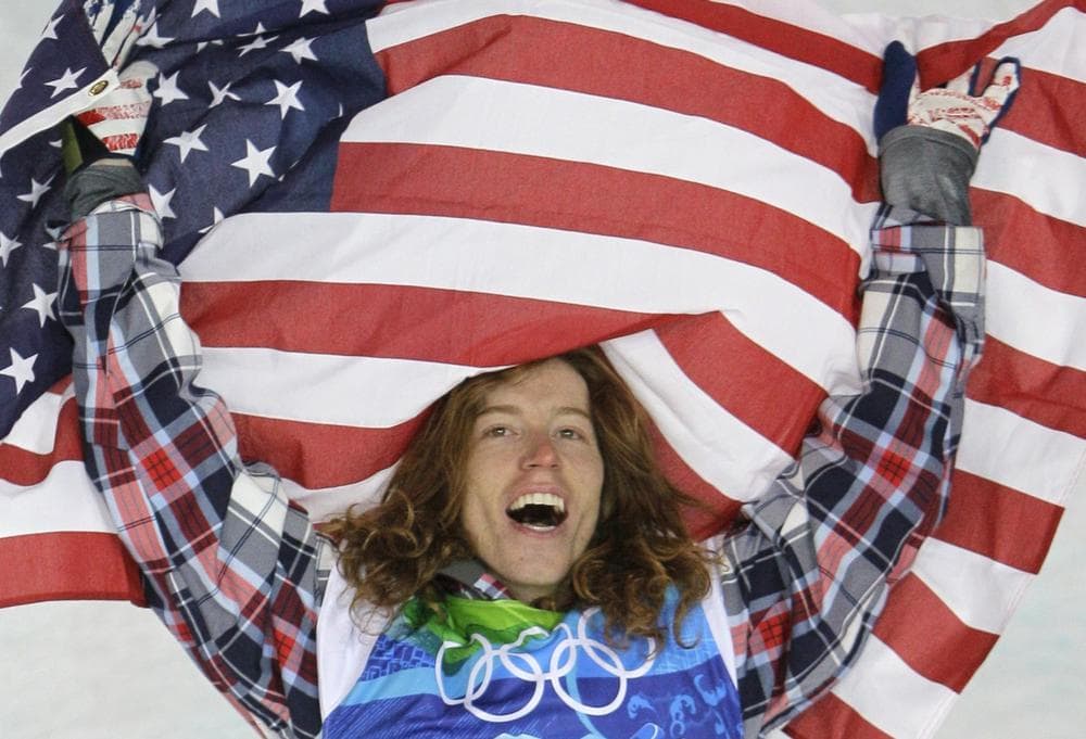 U.S. Olympic champion Shaun White celebrates after the men's snowboard half-pipe final at the Vancouver 2010 Olympics on Wednesday. (AP)