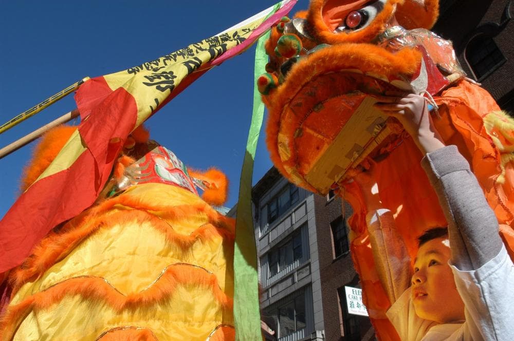 Win King Hu, 8, of Boston, performs a lion dance during the Lunar New Year celebration in Boston&#39;s Chinatown in 2004. (AP)