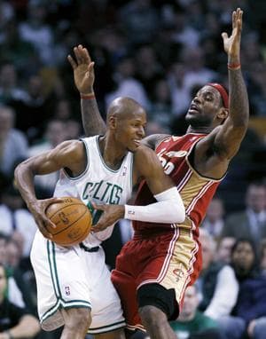 Boston Celtics&#39; Ray Allen looks to move past Cleveland Cavaliers&#39; LeBron James in the fourth quarter of Thursday&#39;s game. (AP Photo)