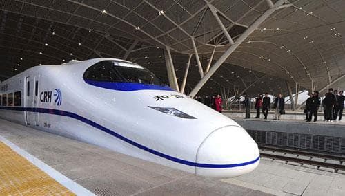 In this photo distributed by the Xinhua news agency, a high-speed train is seen at the Wuhan Railway Station in Wuhan, central China, on Saturday Dec. 26, 2009. The Wuhan-Guangzhou line is China&#039;s longest high-speed railway and one of the world&#039;s fastest with an average speed around 217 mile per hour (350kph). (AP/Xinhua)