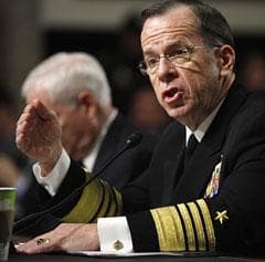 Joint Chiefs Chairman Adm. Michael Mullen, right, accompanied by Defense Secretary Robert Gates, testifies on Capitol Hill on Tuesday, Feb. 2, 2010, before a Senate Armed Services Committee hearing on the &quot;Don&#039;t Ask, Don&#039;t Tell&quot; policy. (AP)