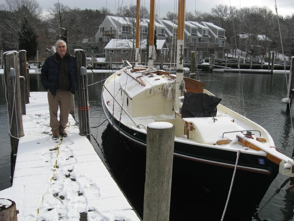 Bill Eddy of East Falmouth built his own schooner, and would one day soon like to sail through the proposed wind farm known as Cape Wind. (WBUR/Curt Nickisch)
