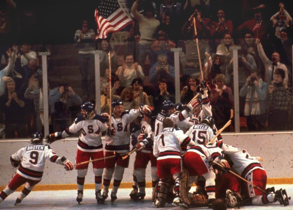 The U.S. hockey team pounces on goalie Jim Craig after a 4-3 victory against the Soviets in the 1980 Olympics in Lake Placid, N.Y., February 22, 1980. (AP Photo)