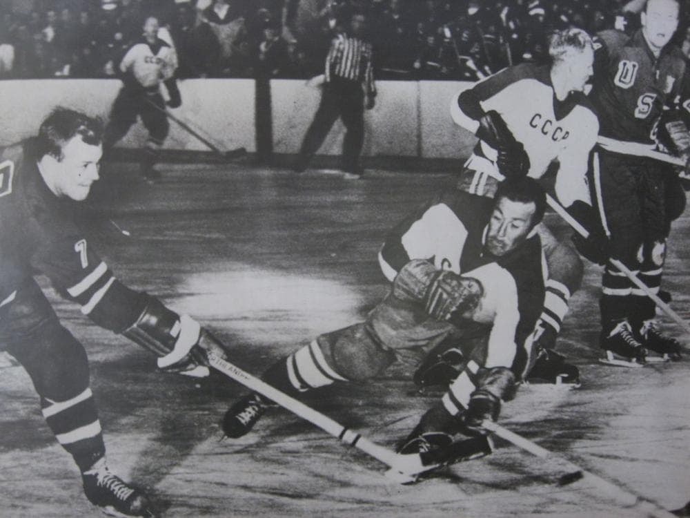 Bill Cleary, left, scores a goal against the Soviet Union in the 1960 Winter Olympics in Squaw Valley, Calif. Cleary&#39;s brother, Bob, far right, was also on the team. (Courtesy Bill Cleary)