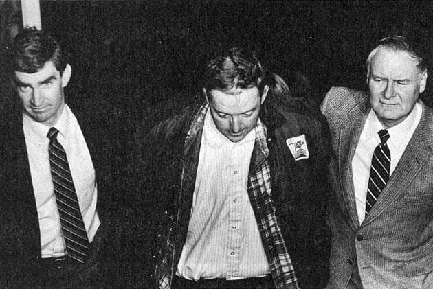 Then state police Trooper Brian Howe, left, arrested Tufts University Professor William Douglas (in an unrelated murder case), with state police Lt. James Sharkey, right, in 1983. Three years later, Sharkey would assign Howe to investigate the Braintree shooting of Seth Bishop by his sister, Amy. (John Landers/Boston Herald)
