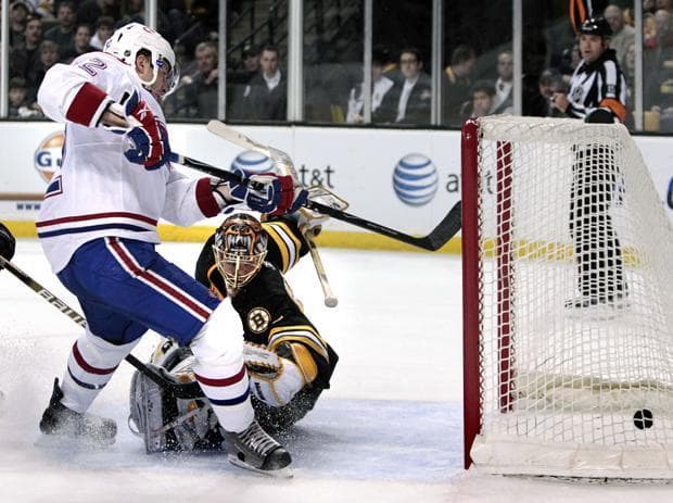 Montreal Canadiens left wing Mathieu Darche scores against Boston Bruins goalie Tuukka Rask during Tuesday&#39;s game in Boston. (AP)