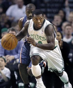 Celtics guard Nate Robinson leaves Bobcats guard Raymond Felton behind during Wednesday&#39;s game in Boston. (AP)